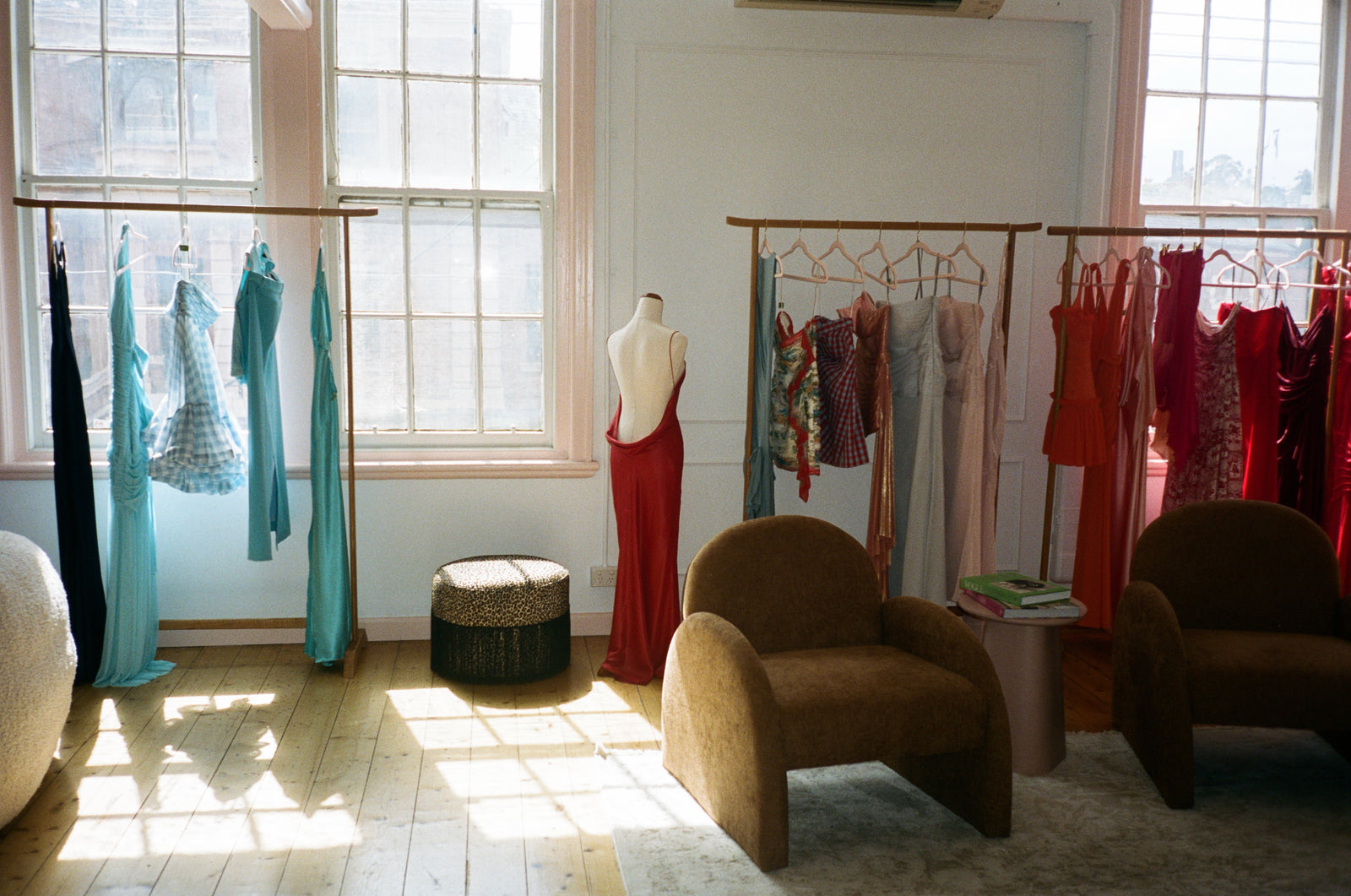 Dresses on the rails in the Are Kae studio